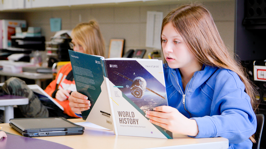 Young student with Traverse print companion.