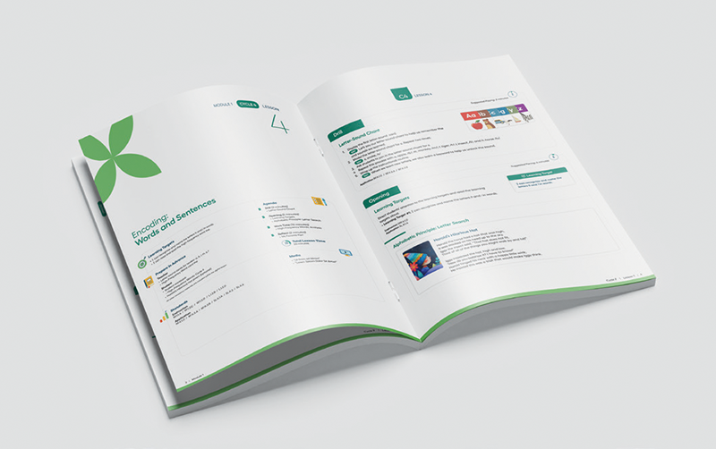 Print teacher edition laying flat on a table. 